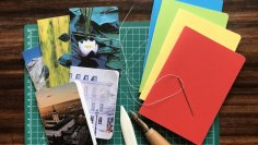 Postkarten mit diversen Motiven und farbiges Papier